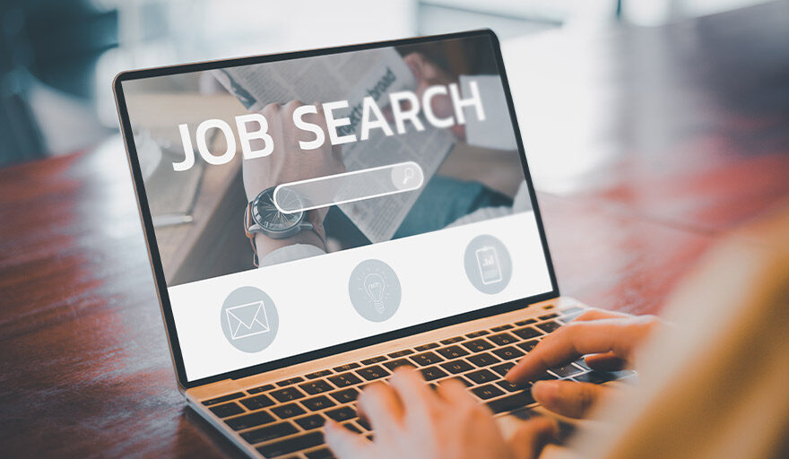 Laptop screen that says "Job Search"
