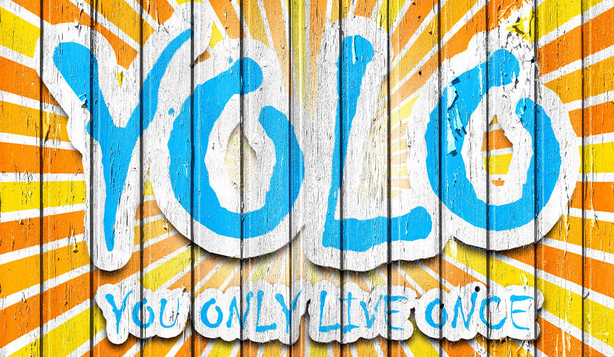 Wall painted with "YOLO You Only Live Once"