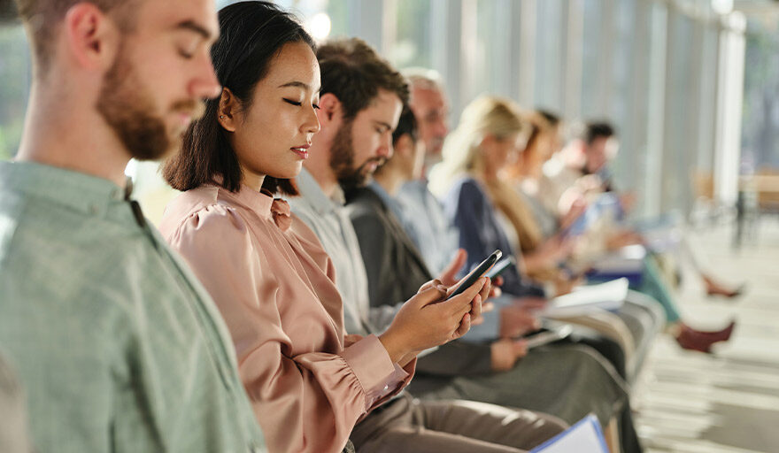 Group of professionals sitting in a line